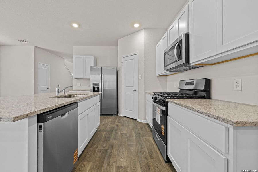 Furnished interior view inside a new home in Redbird Ranch, San Antonio (Image 10).