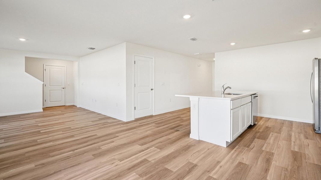 Representative unfurnished interior of a home built from the Ensley by D.R. Horton in Sandal Key, Weeki Wachee (Image 20).
