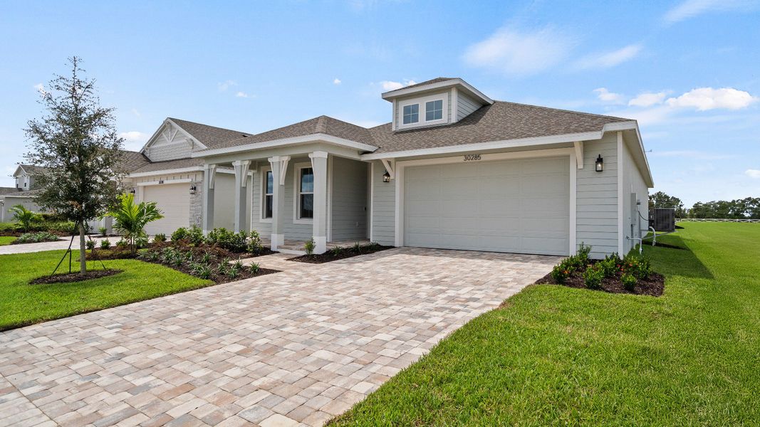 Front Exterior of the Buttonwood by DRB Homes in Trailside located in Mount Dora, FL.
