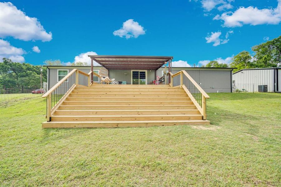 Exterior details and patio area of a home in , Palmer (Image 20).