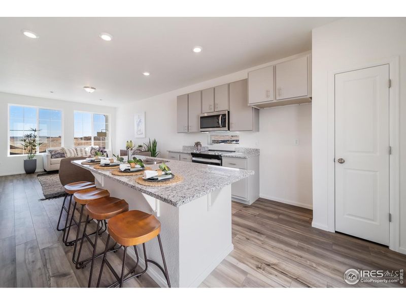 Furnished interior view inside a new home in Thompson River Ranch, Johnstown (Image 4).