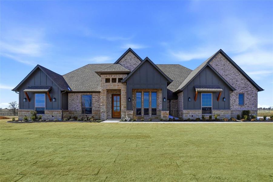 Front exterior of a new home in , Godley, TX, highlighting curb appeal (Image 25).