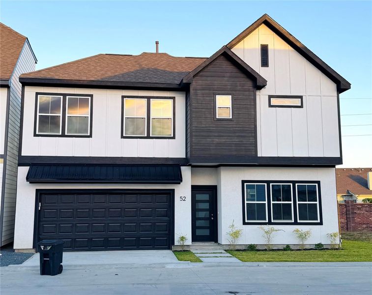 Front exterior of a new home in Metro Village, Houston, TX, highlighting curb appeal (Image 2).