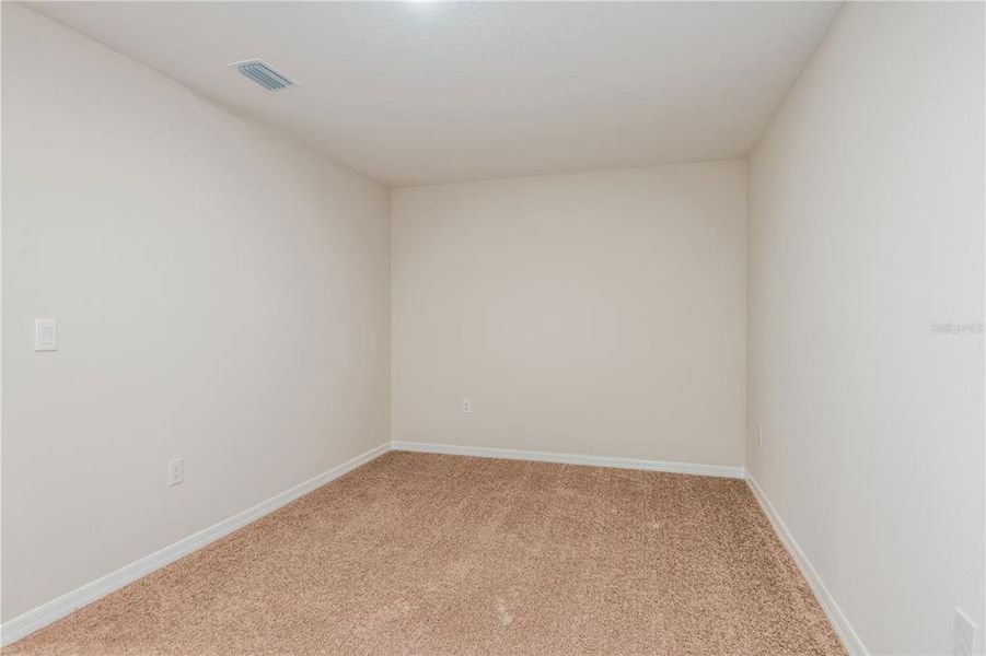 Spacious, unfurnished interior of a new home in Grove at Crosswind, Haines City (Image 15).