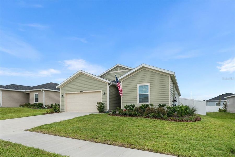 Front exterior of a new home in , Alachua, FL, highlighting curb appeal (Image 22).