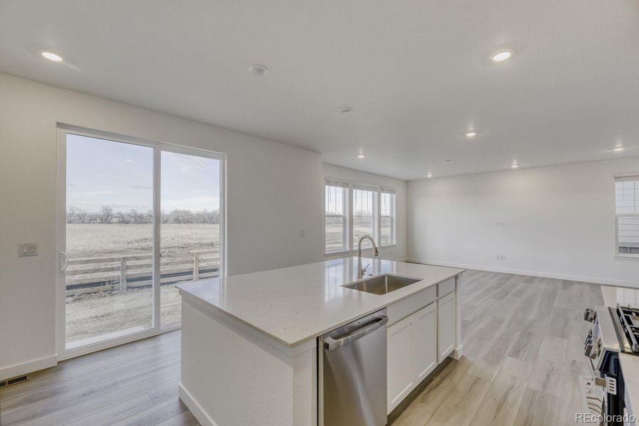 Furnished interior view inside a new home in Vermilion Creek, Centennial (Image 7).