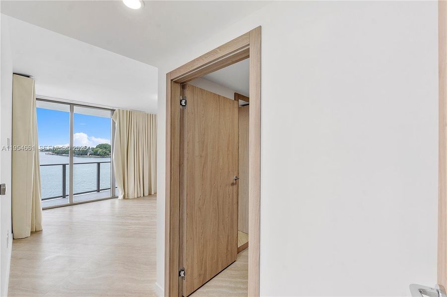 Spacious, unfurnished interior of a new home in , Bay Harbor Islands (Image 19). Spacious, unfurnished interior of a new home in , Bay Harbor Islands (Image 19).