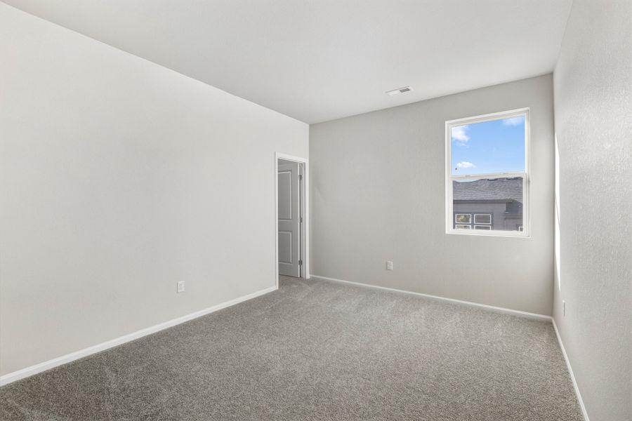 Spacious, unfurnished interior of a new home in Talon Pointe, Thornton (Image 17).