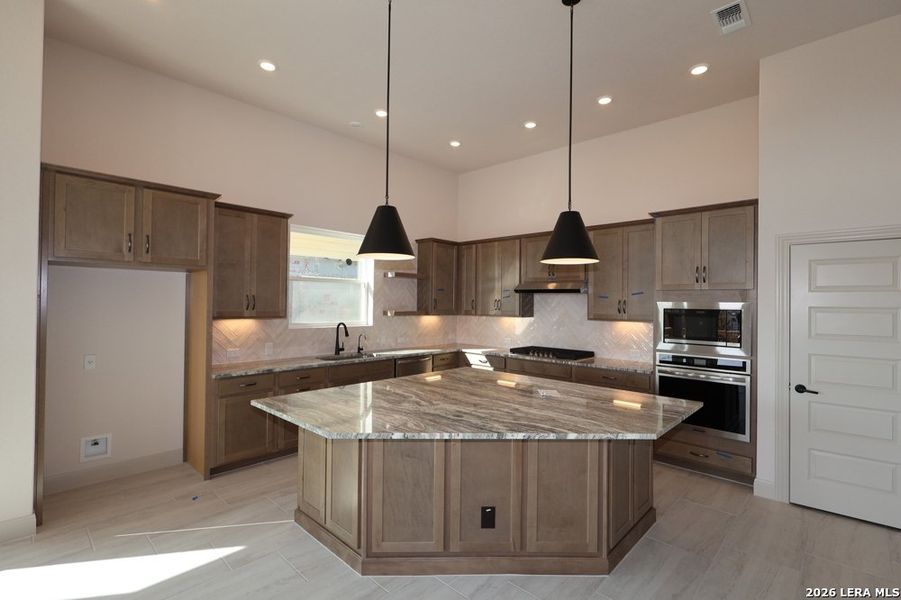 Furnished interior view inside a new home in Windsong - Reserve Series, Boerne (Image 5).
