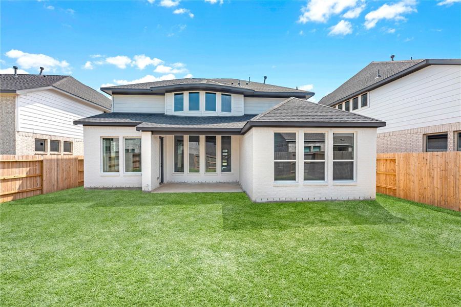 Exterior details and patio area of a home in Sunterra (Katy ISD), Katy (Image 2). Exterior details and patio area of a home in Sunterra (Katy ISD), Katy (Image 2).
