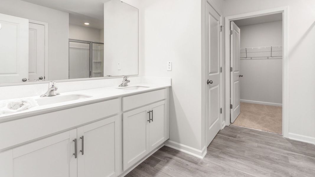 Representative furnished interior of a home built from the PENWELL by D.R. Horton in English Farm, Archdale (Image 6).