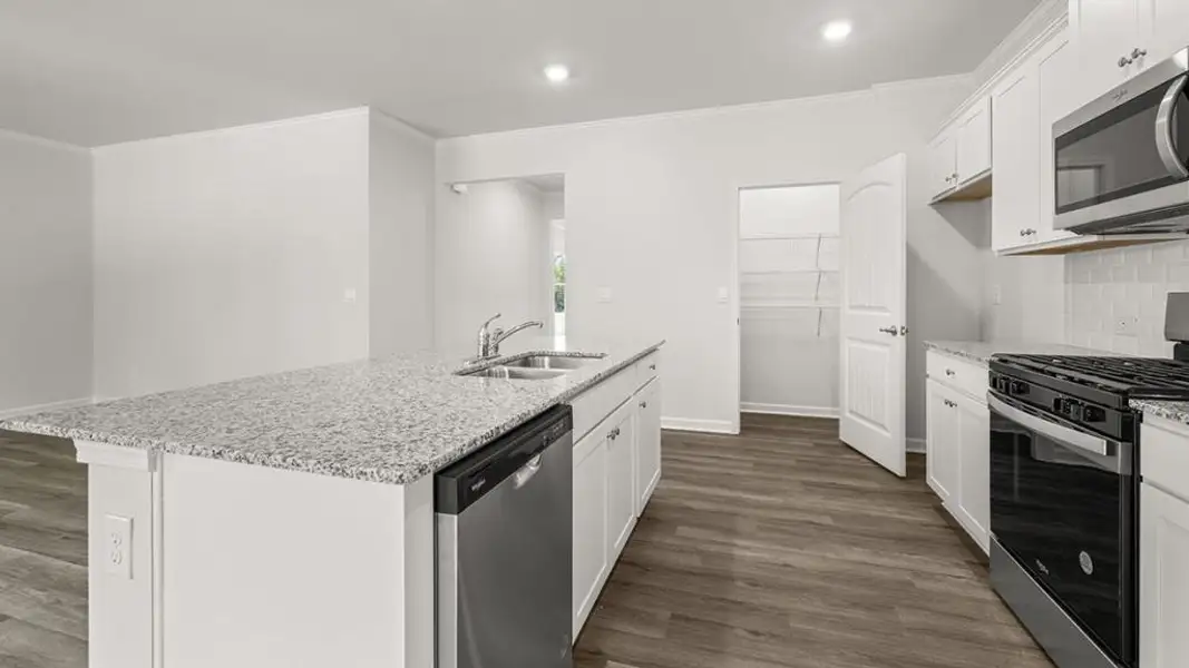 Furnished interior view inside a new home in Oaks at Cedar Grove, Fairburn (Image 6).