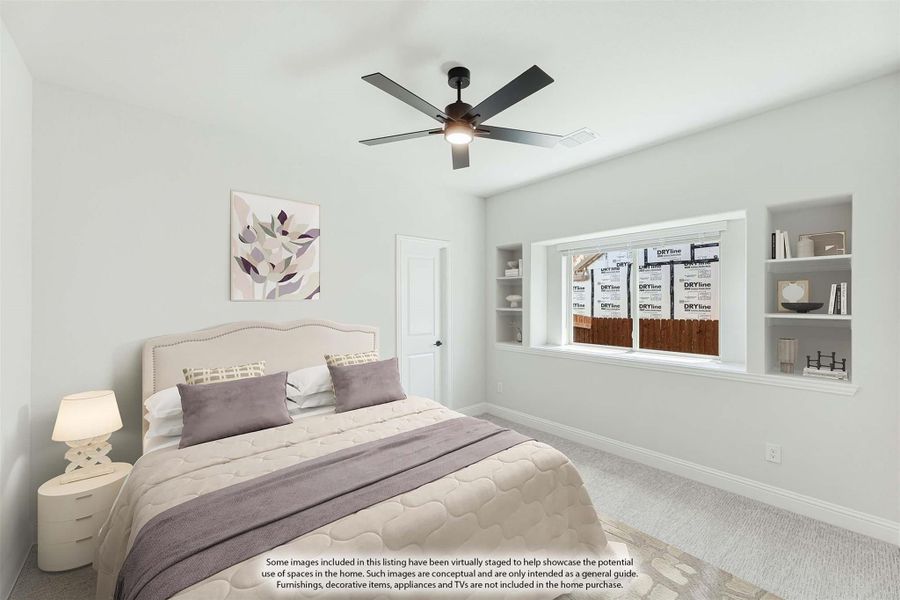 Bedroom with ceiling fan, built-in wall shelves, large window, and carpeted floor