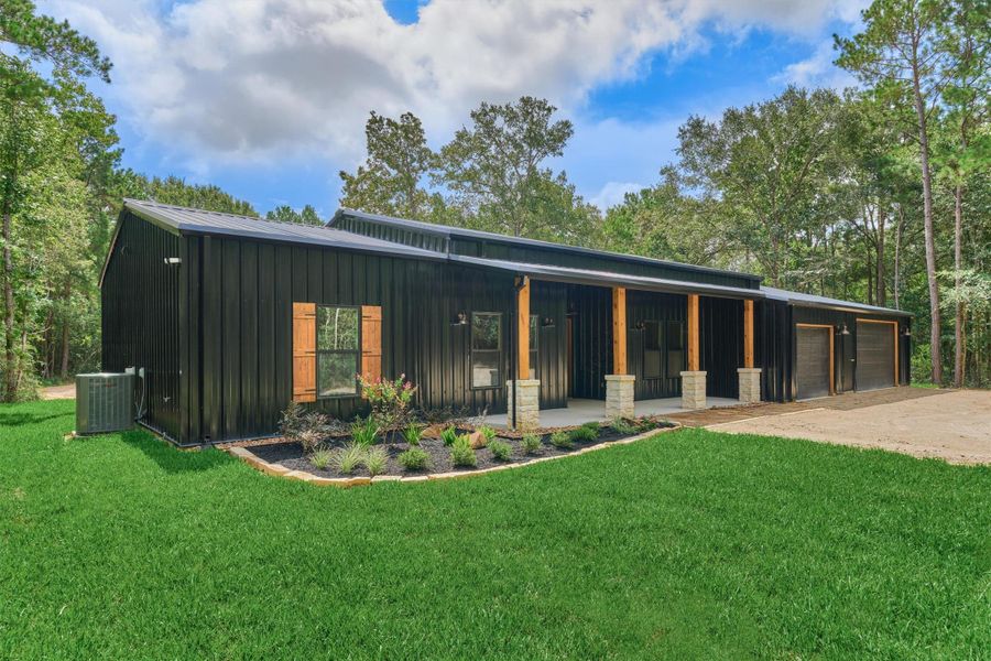 Thoughtfully designed inside and out w/ a 3-car garage with ample space for workshop!