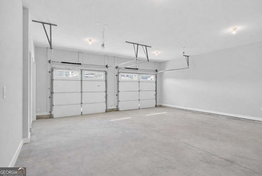 Spacious, unfurnished interior of a new home in The Cottages at East Lanier, Fayetteville (Image 17).