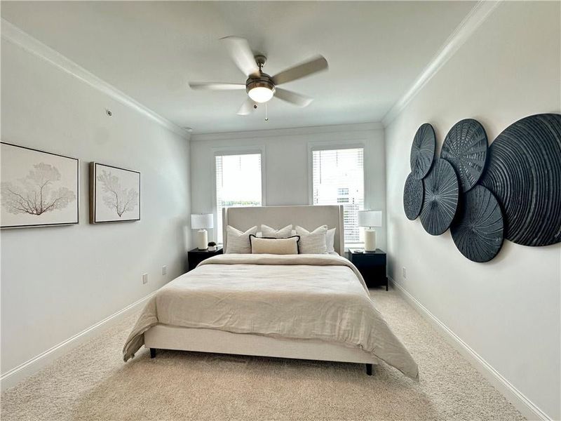 Owners Suite with Walk In Closet, ceiling fan and Private bathroom *Photos shown are from same floor plan, but different staged home*