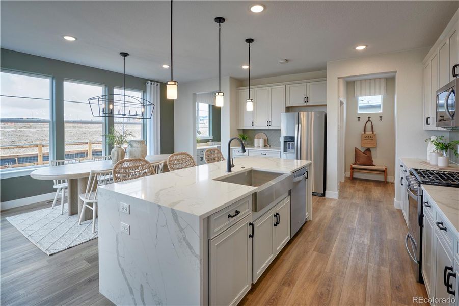 Furnished interior view inside a new home in The Aurora Highlands, Aurora (Image 9).