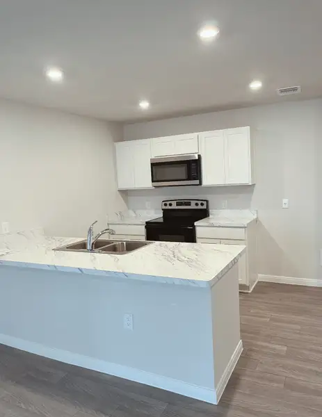 Representative furnished interior of a home built from the Big Bend by National HomeCorp in Villages of Mayfield, Cleburne (Image 6).