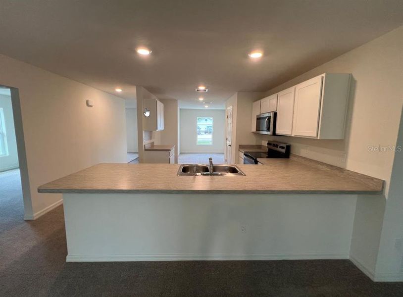 Furnished interior view inside a new home in Palm Coast: Value Collection, Palm Coast (Image 5).