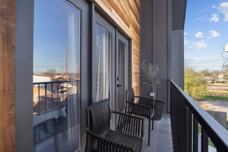Balcony sitting off of the primary bedroom. Balcony sitting off of the primary bedroom.