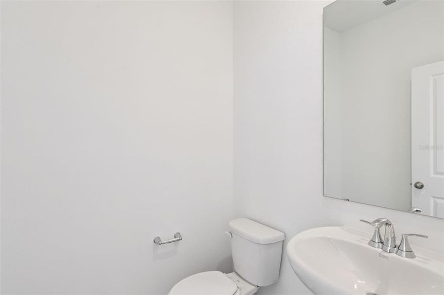 Furnished interior view inside a new home in Flagler Village - Classic Series, Palm Coast (Image 11). Furnished interior view inside a new home in Flagler Village - Classic Series, Palm Coast (Image 11).