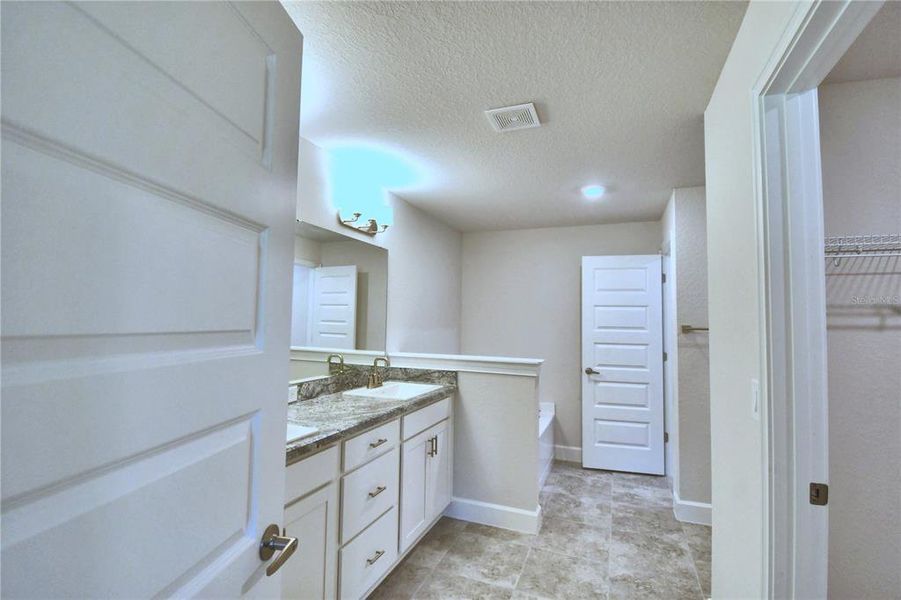 Furnished interior view inside a new home in Cadence Crossing, Auburndale (Image 6).