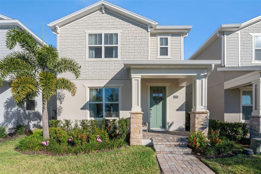 Front exterior of a new home in , Winter Garden, FL, highlighting curb appeal (Image 28).