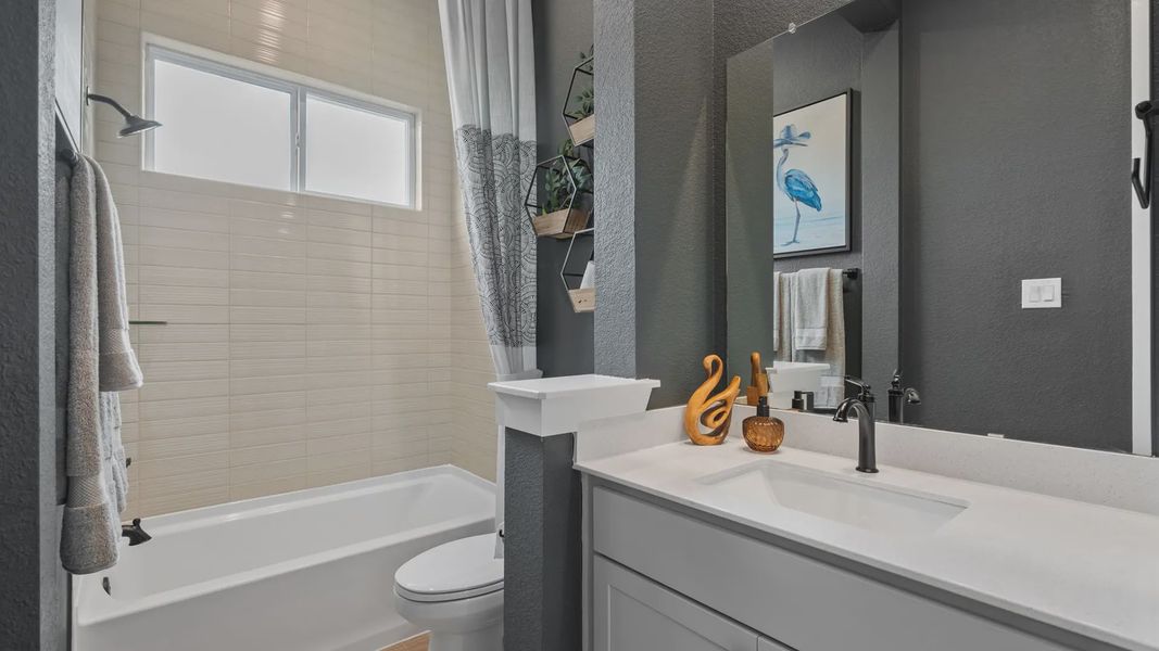 Representative furnished interior of a home built from the Acadia by Chesmar Homes in Elyson 50's, Katy (Image 28).