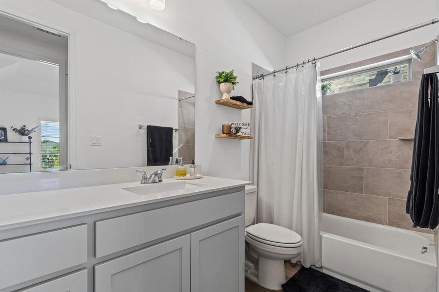 Furnished interior view inside a new home in Parkside On The River 45', Georgetown (Image 5).