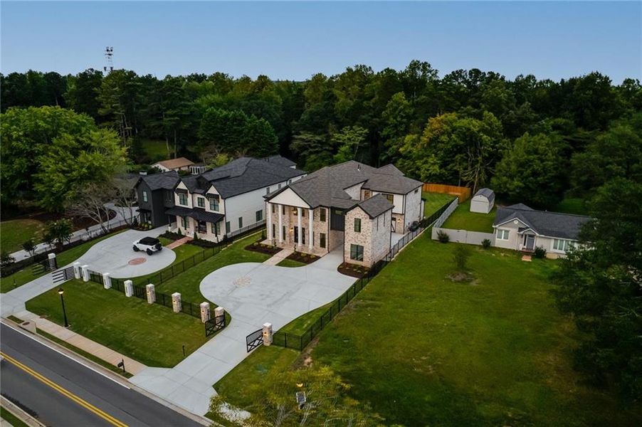 Front exterior of a new home in , Buford, GA, highlighting curb appeal (Image 27). Front exterior of a new home in , Buford, GA, highlighting curb appeal (Image 27).