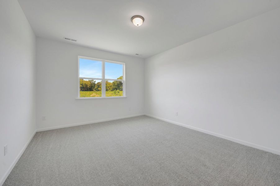 Spacious, unfurnished interior of a new home in Providence Creek, Fuquay Varina (Image 24).