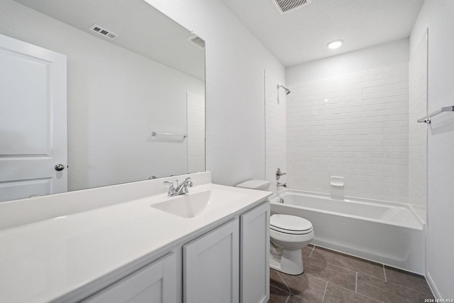 Furnished interior view inside a new home in Hennersby Hollow, San Antonio (Image 9).
