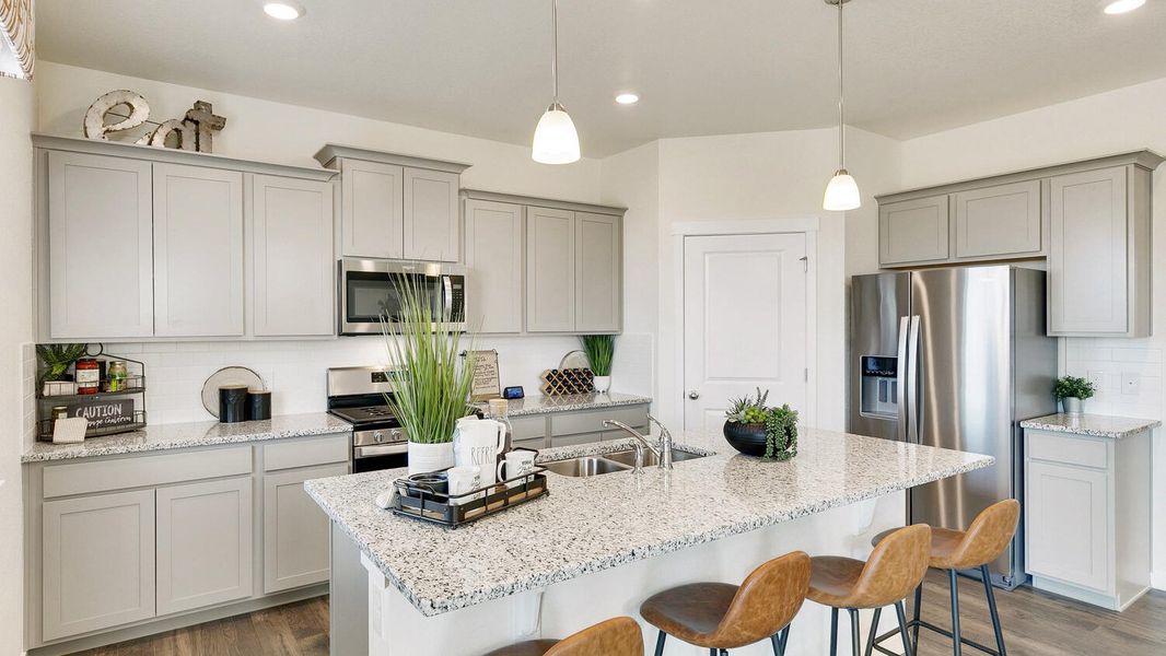 Representative furnished interior of a home built from the Holcombe by D.R. Horton in Settlers Crossing, Commerce City (Image 12).
