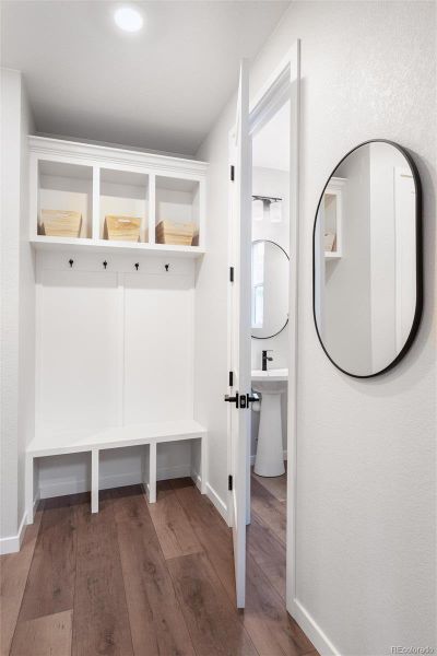 Mudroom area right off the garage with custom built-ins.