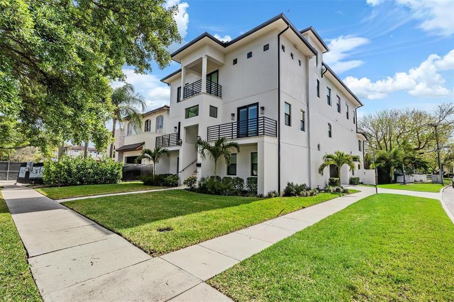 Front exterior of a new home in , Tampa, FL, highlighting curb appeal (Image 30).