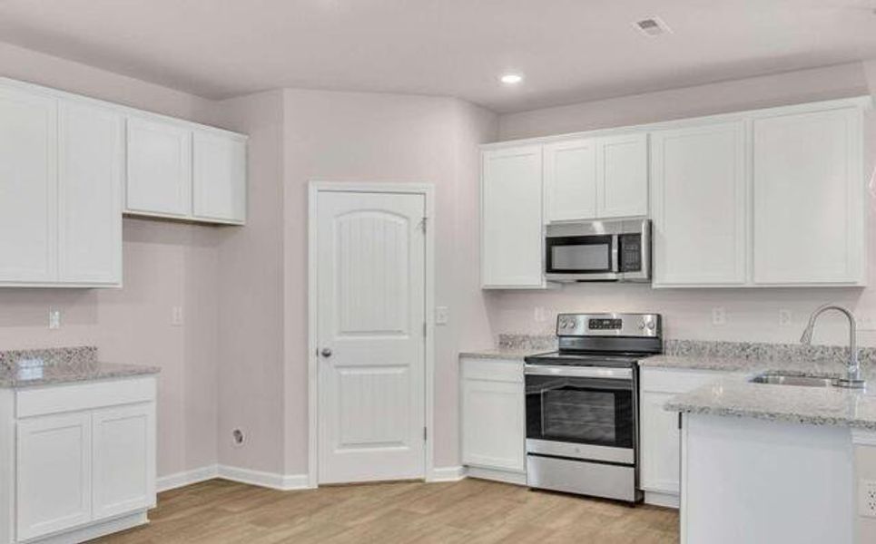 Furnished interior view inside a new home in River Walk Farm, Covington (Image 4).
