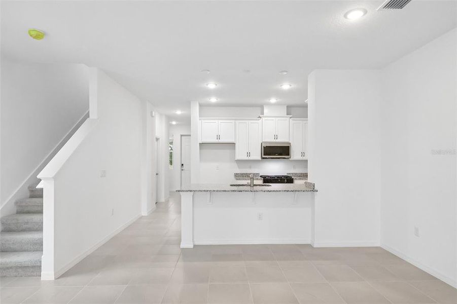 Furnished interior view inside a new home in Eagletail Landings, Howey-in-the-Hills (Image 8).