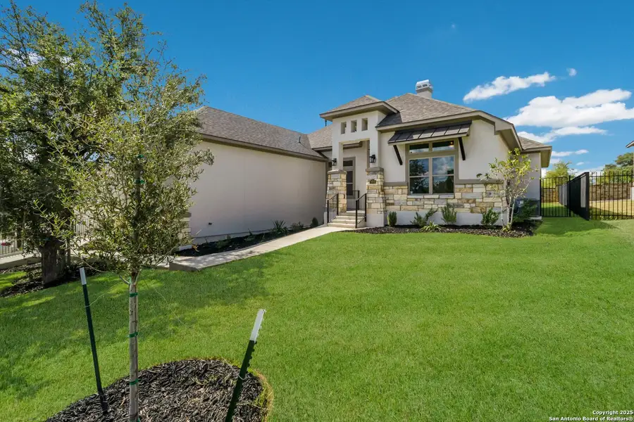 Front exterior of a new home in Johnson Ranch, Bulverde, TX, highlighting curb appeal (Image 2).