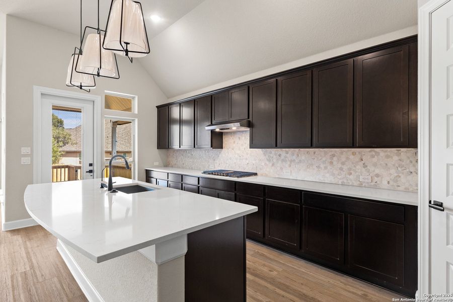 Furnished interior view inside a new home in The Enclave at Potranco Oaks, Castroville (Image 7).