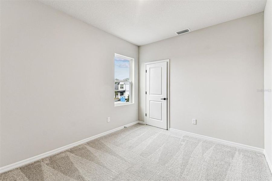 Spacious, unfurnished interior of a new home in Oakfield at Mount Dora Village Series, Mount Dora (Image 39).