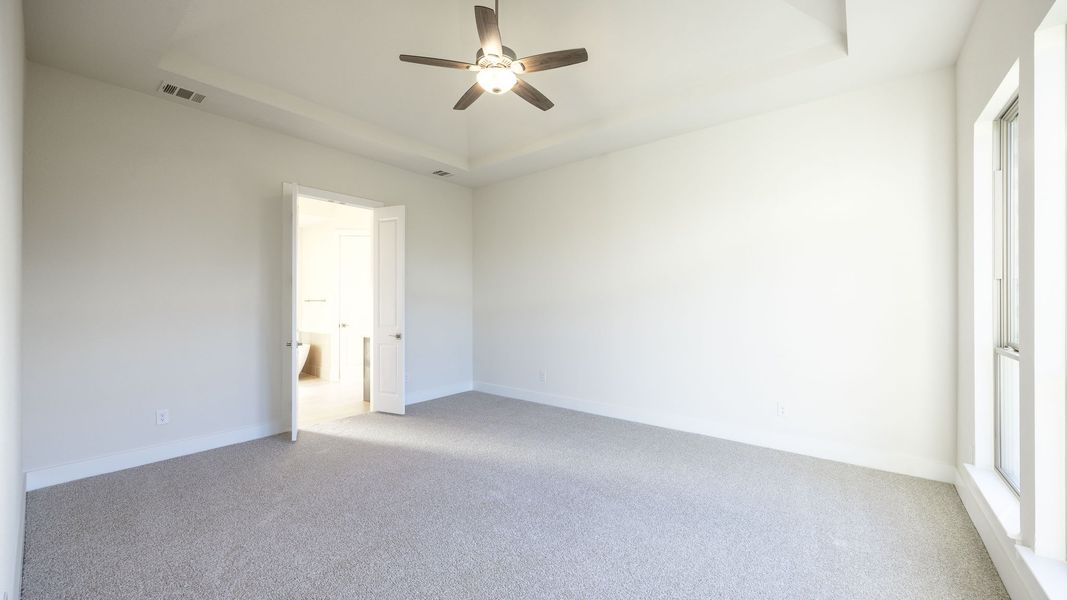 Spacious, unfurnished interior of a new home in Eldorado At Santa Rita Ranch 60', Liberty Hill (Image 21).