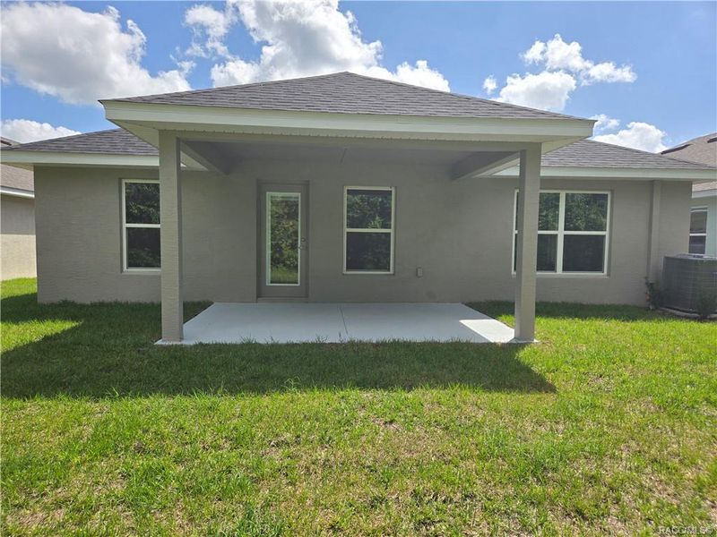 Exterior details and patio area of a home in Wyld Palms, Inverness (Image 16).