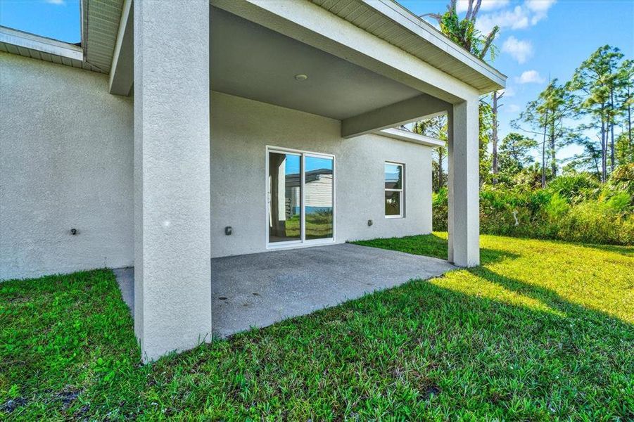 Exterior details and patio area of a home in , North Port (Image 3).