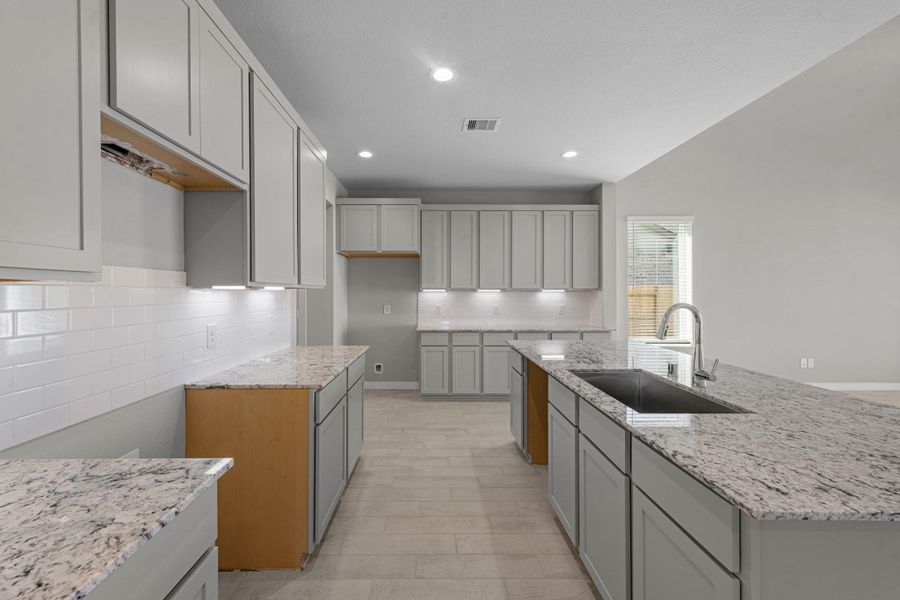 Furnished interior view inside a new home in Sunterra Lakes, Brookshire (Image 9).