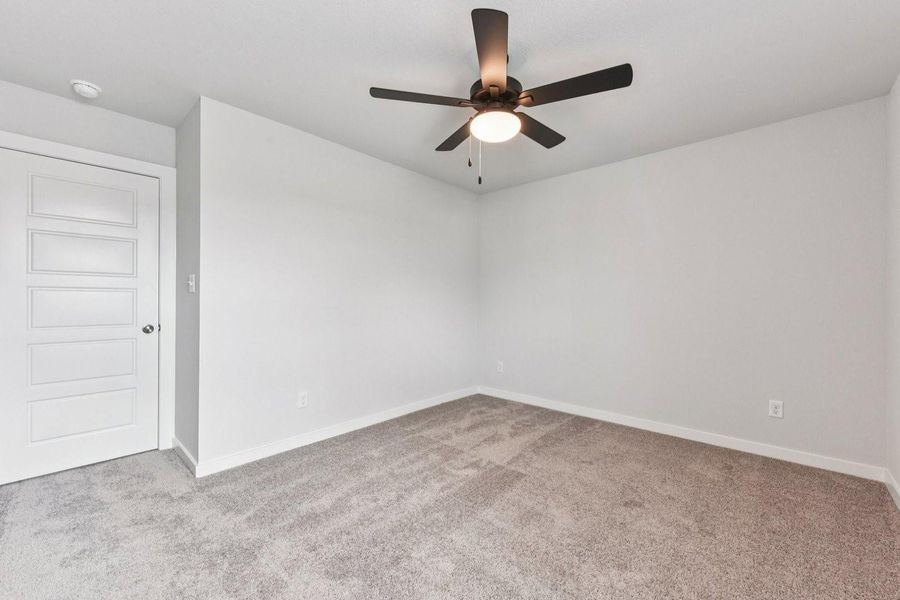 Spacious, unfurnished interior of a new home in Stallion Run, Buda (Image 32).