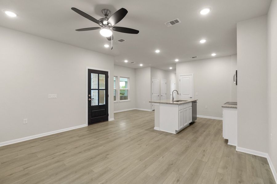 Spacious, unfurnished interior of a new home in Whisper Valley, Manor (Image 25). Spacious, unfurnished interior of a new home in Whisper Valley, Manor (Image 25).