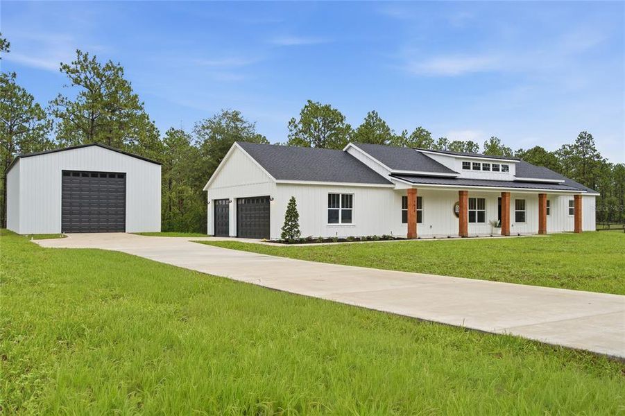Front exterior of a new home in , Ocala, FL, highlighting curb appeal (Image 21).