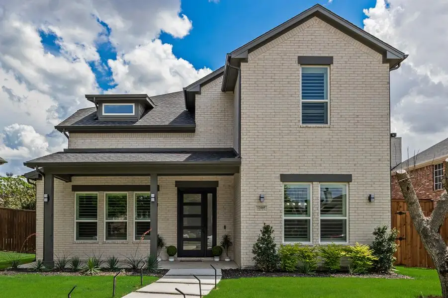 Front exterior of a new home in , Frisco, TX, highlighting curb appeal (Image 1). Front exterior of a new home in , Frisco, TX, highlighting curb appeal (Image 1).