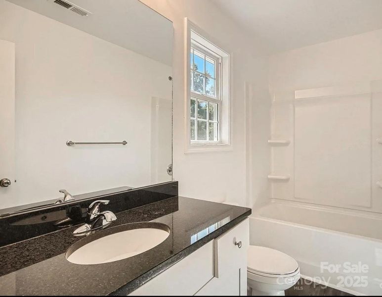 Furnished interior view inside a new home in , Albemarle (Image 5).