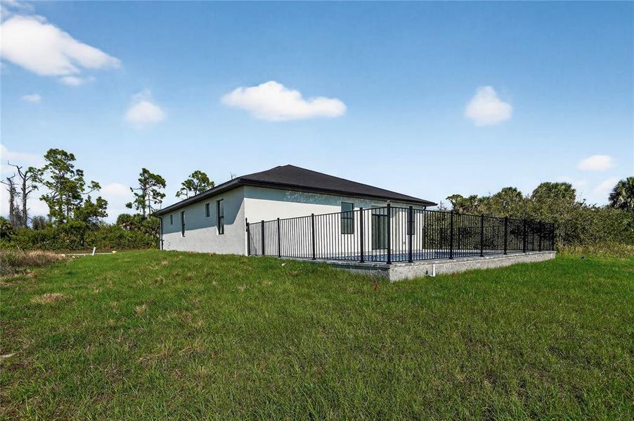 Exterior details and patio area of a home in , Rotonda West (Image 32).